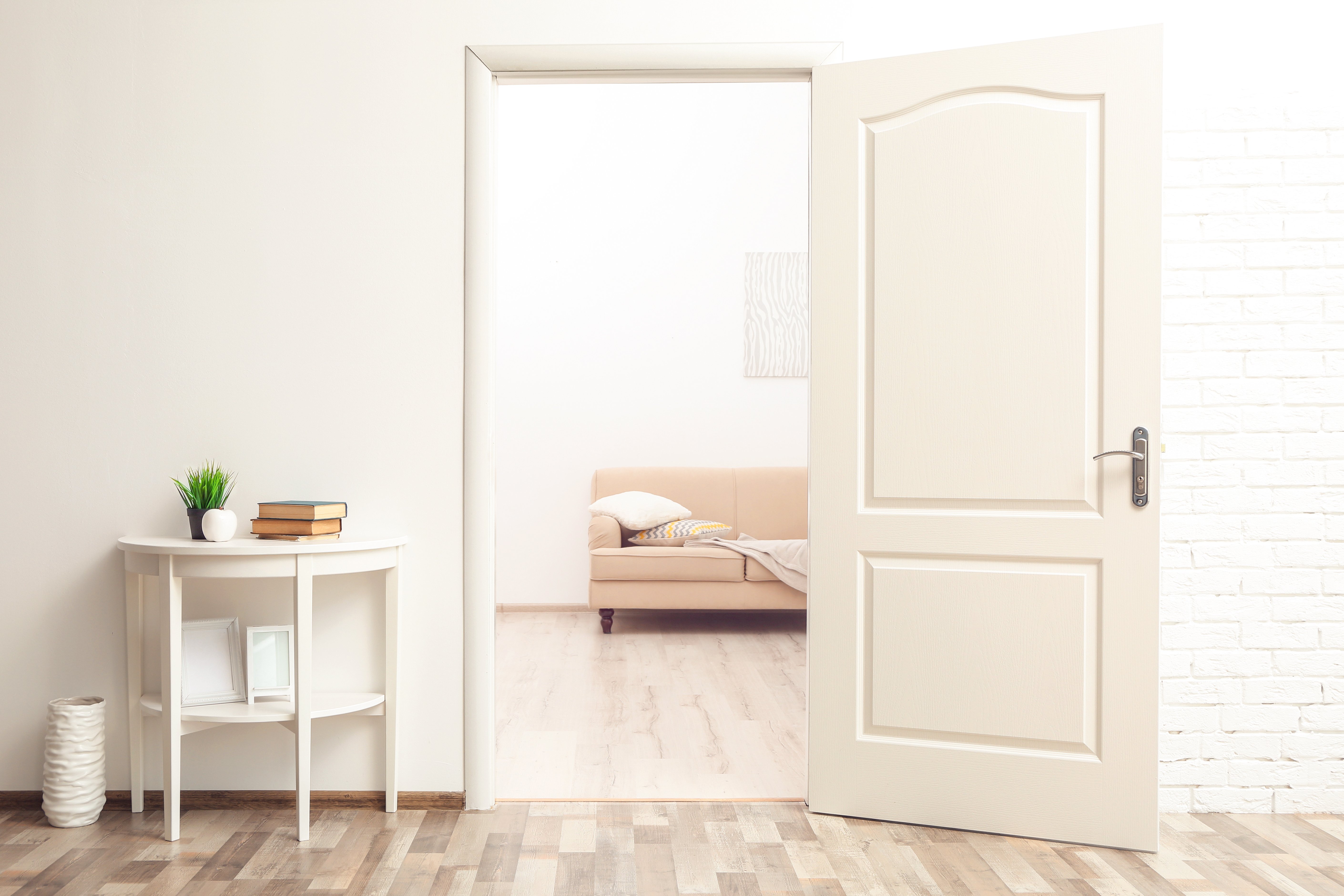 White Room Interior with Open Door