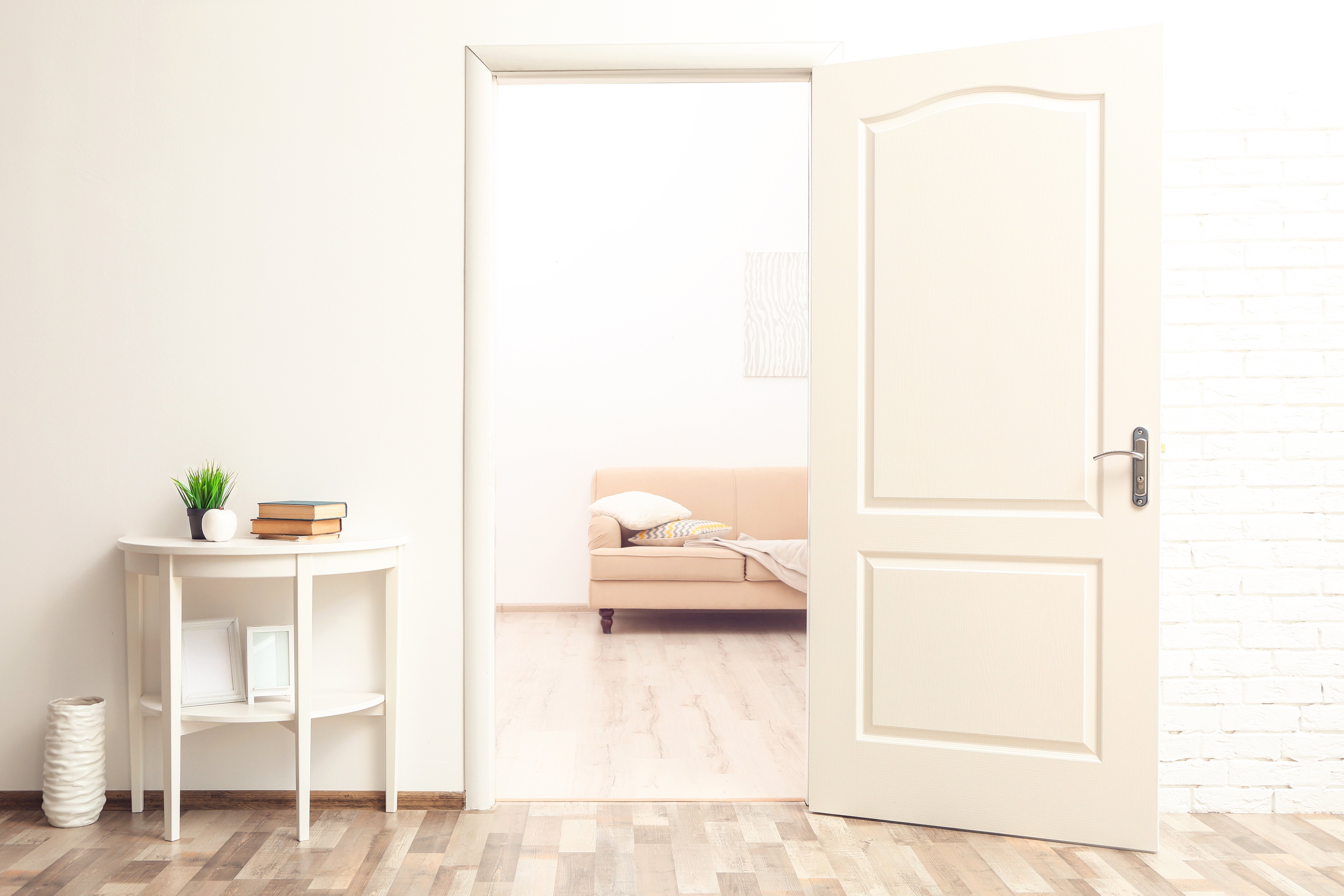 White Room Interior with Open Door